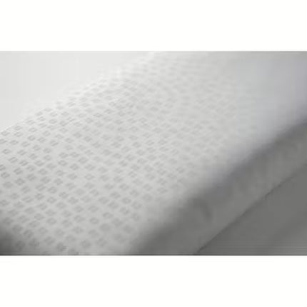 A close-up of a white textured fabric or material with a subtle repeating geometric pattern, shown against a light gray background.