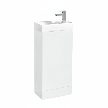White bathroom vanity unit with sink and faucet on a white background