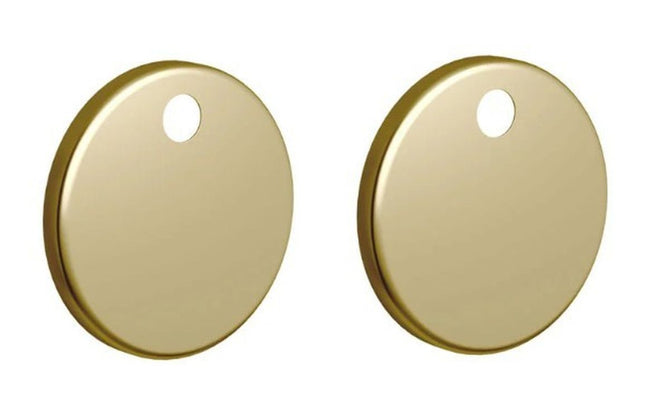 Pair of gold round seat hinge covers on a white background